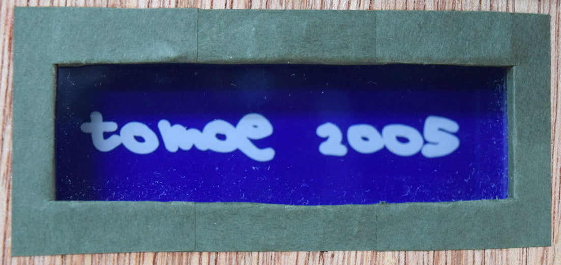 トモエ(Tatsuki Hayama/巴山竜来)「Flashlight」オリジナル(アルミにデカール) 額裏拡大画像1