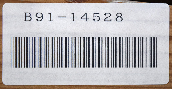 富谷一明「静日」油絵・F8号 裏側拡大画像1(「一枚の繪」管理番号シール)