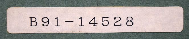 富谷一明「静日」油絵・F8号 額裏シール拡大画像(「一枚の繪」管理番号シール)